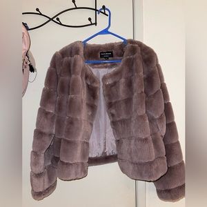 Lilac Faux fur jacket size L with silk lining on the inside